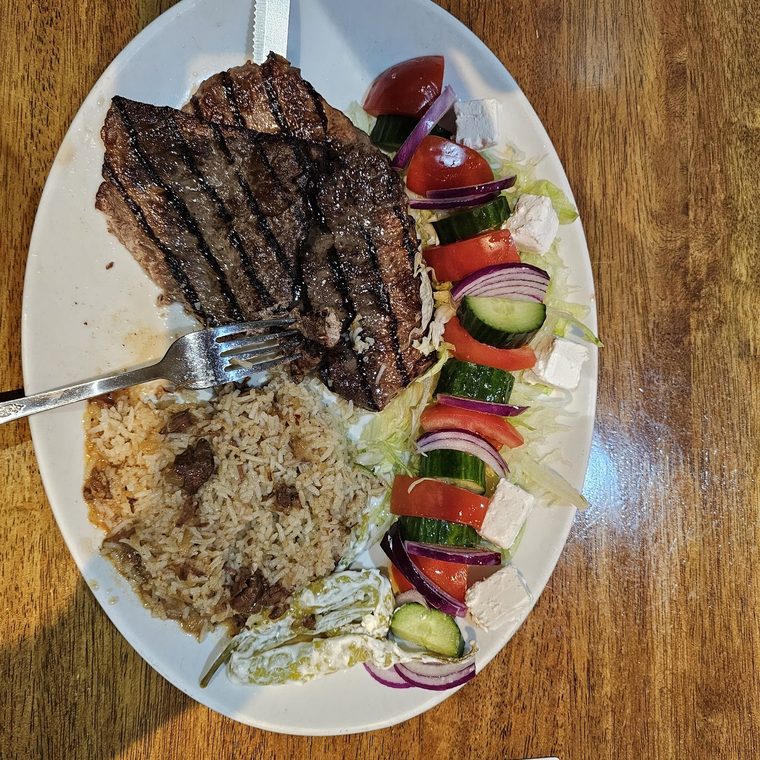 Grilled lamb chops with rice and salad
