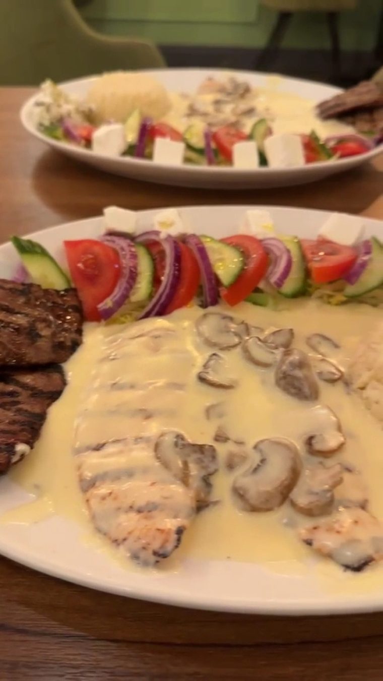 Chicken breast in creamy mushroom sauce with rice